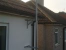 Over the Gutter pole on T&K brackets