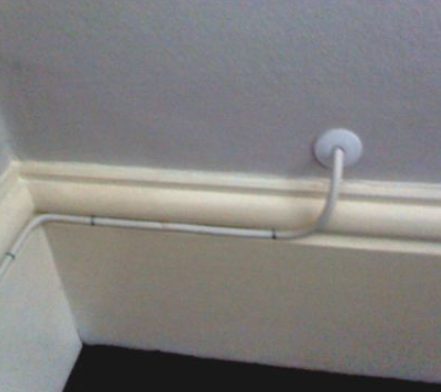 professional installation offer a neat cable installation. It is easy, so why do so many 'installers' just leave a ragged hole and cable loose on the floor?